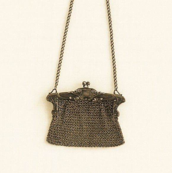 Antique Whiting & Davis German silver mesh purse with classic silver tone and vintage patina